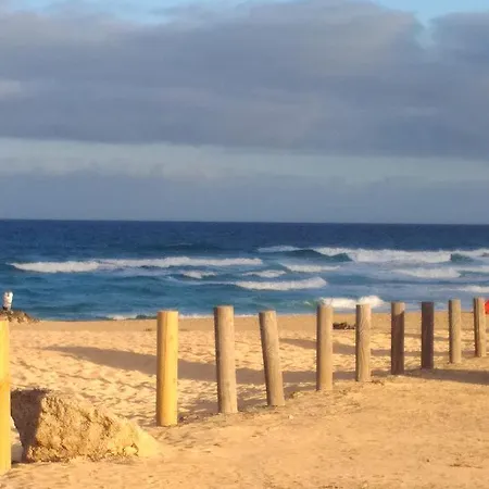 Surf Up Mit Meerblick Проживание в семье *